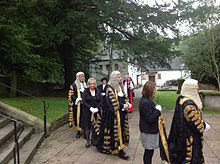 Members of the court gathering at Llandaff Cathedral